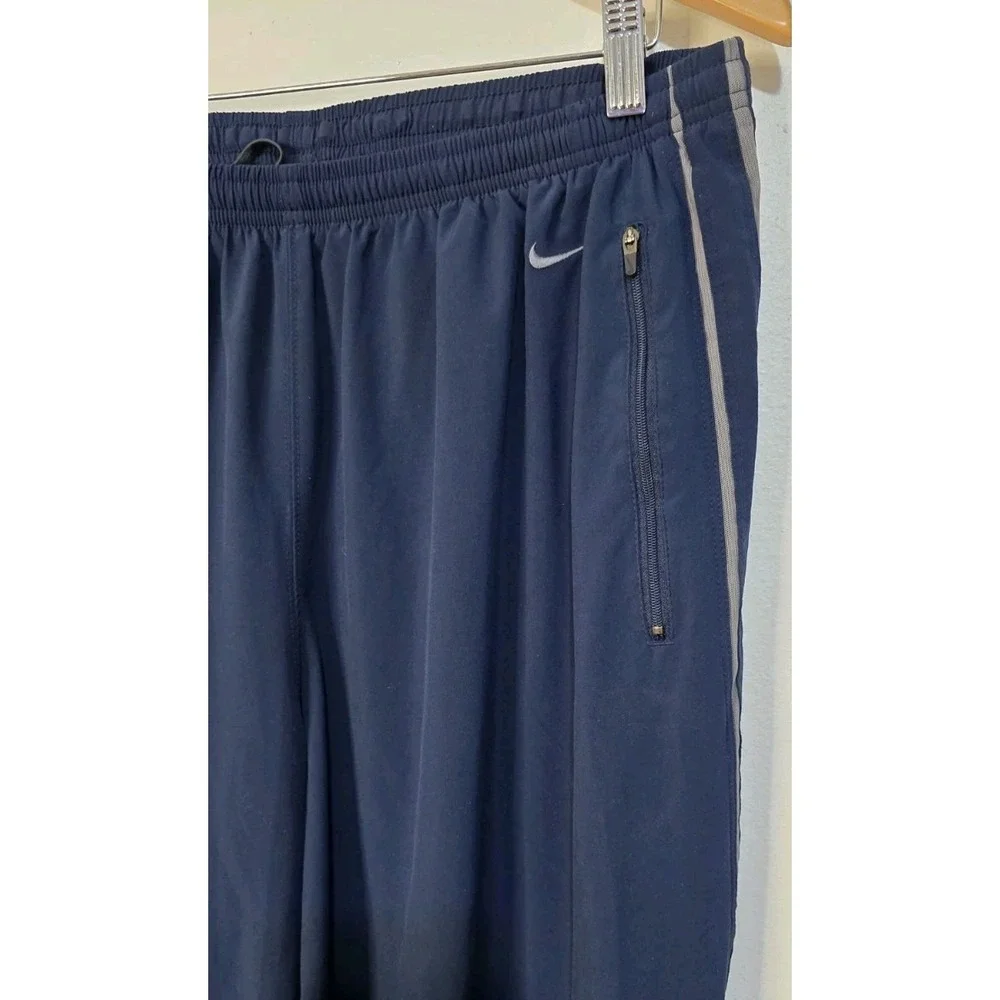 Vintage 90's Nike Nylon Blue Track Pants‎ Sweatpants Men XL Swoosh Zip Ankle